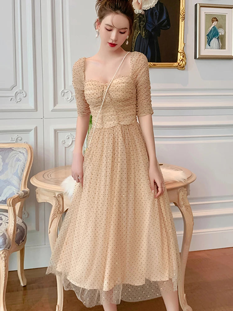 beige polka dot midi dress The Beige V Neck Polka Dot Button Midi Dress