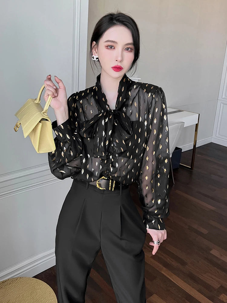 Elegant Black Sheer Blouse With Gold Accents