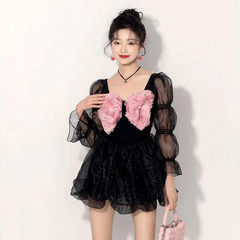 Elegant Black Dress With Pink Flower Accents