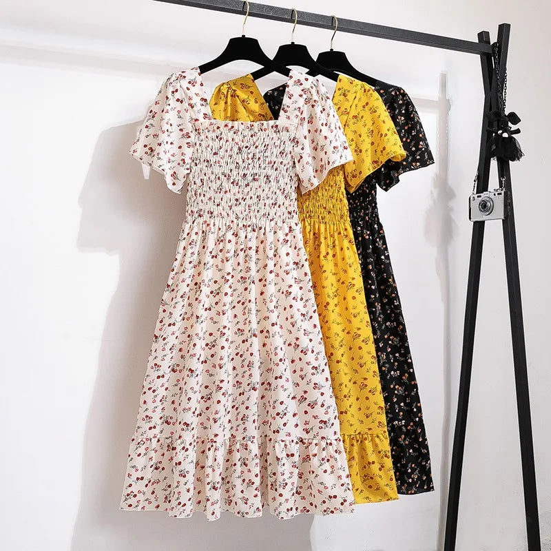 knee length dresses for ladies Gigio Floral Print Mixed Midi Dress Smocked Bodice main image 0