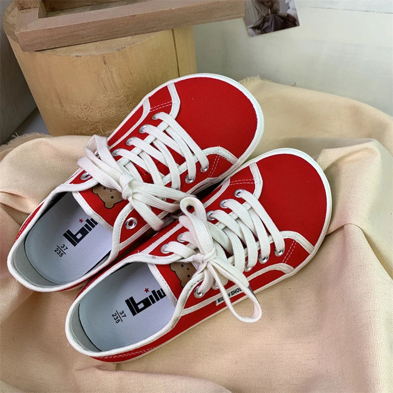 Red canvas lace up sneakers clearance