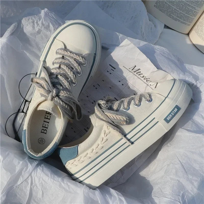 Casual White Canvas Sneakers with Blue Accents