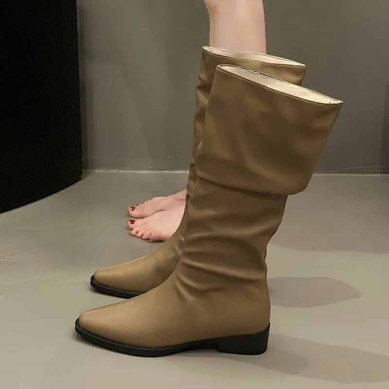 Slouchy knee high flat boots on sale
